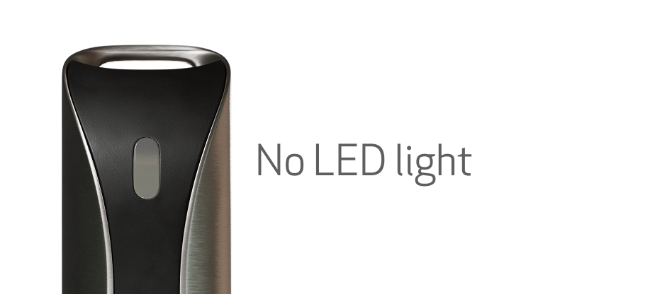 The WellPD wearable on the charger with no LED light